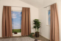 Lagune is een soepelvallende overgordijnstof en een dim-out