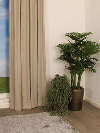 Met overgordijn Oppagne, die een subtiele bouclé effect heeft, creëer je een warme sfeer in huis