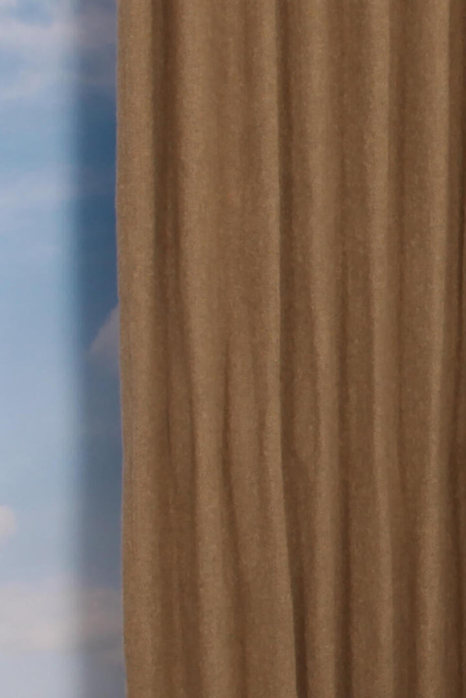 Dompel je onder in een bad van warmte en gezelligheid met deze karaktervolle overgordijnstof