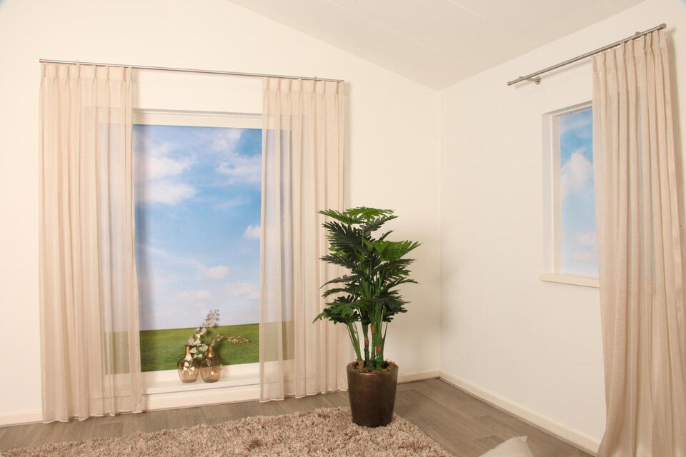 Huven is een mooi vallende vitrage van zware kwaliteit in de kleur champagne